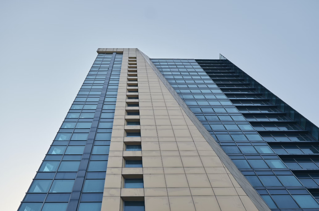 Image of a tall building set against the sky evoking the image of an enterprise business