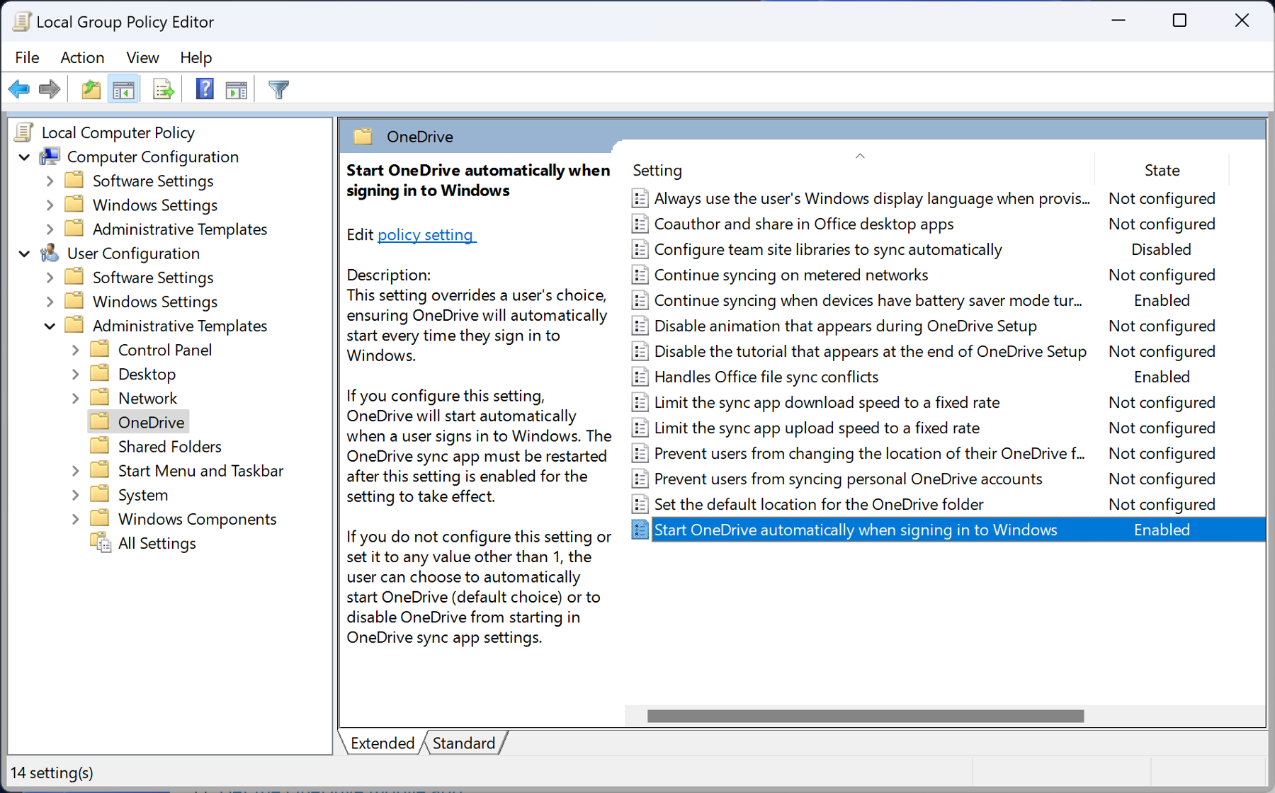 The screenshot shows the selected and enabled group policy, ”Start OneDrive automatically when signing in to Windows.”